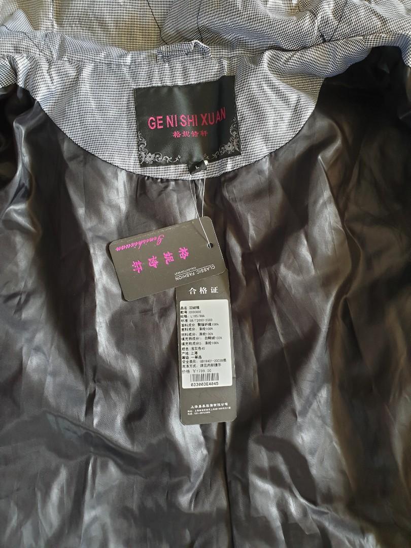 Winter Jacket (Category: Coats, Jackets and Outerwear) located in Singapore. Submitted by vgcl15 (Listing ID 1016038921, Image 2). Description: A gift from a friend. brand new. too tight for me. for someone who is size S. Not for the fussy. High neck : thick and keeps you warm. Jacket is till knee length..