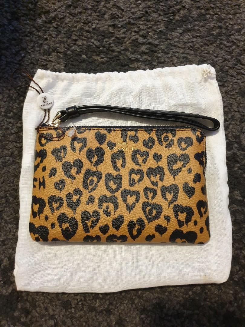Coach best sale cheetah wristlet