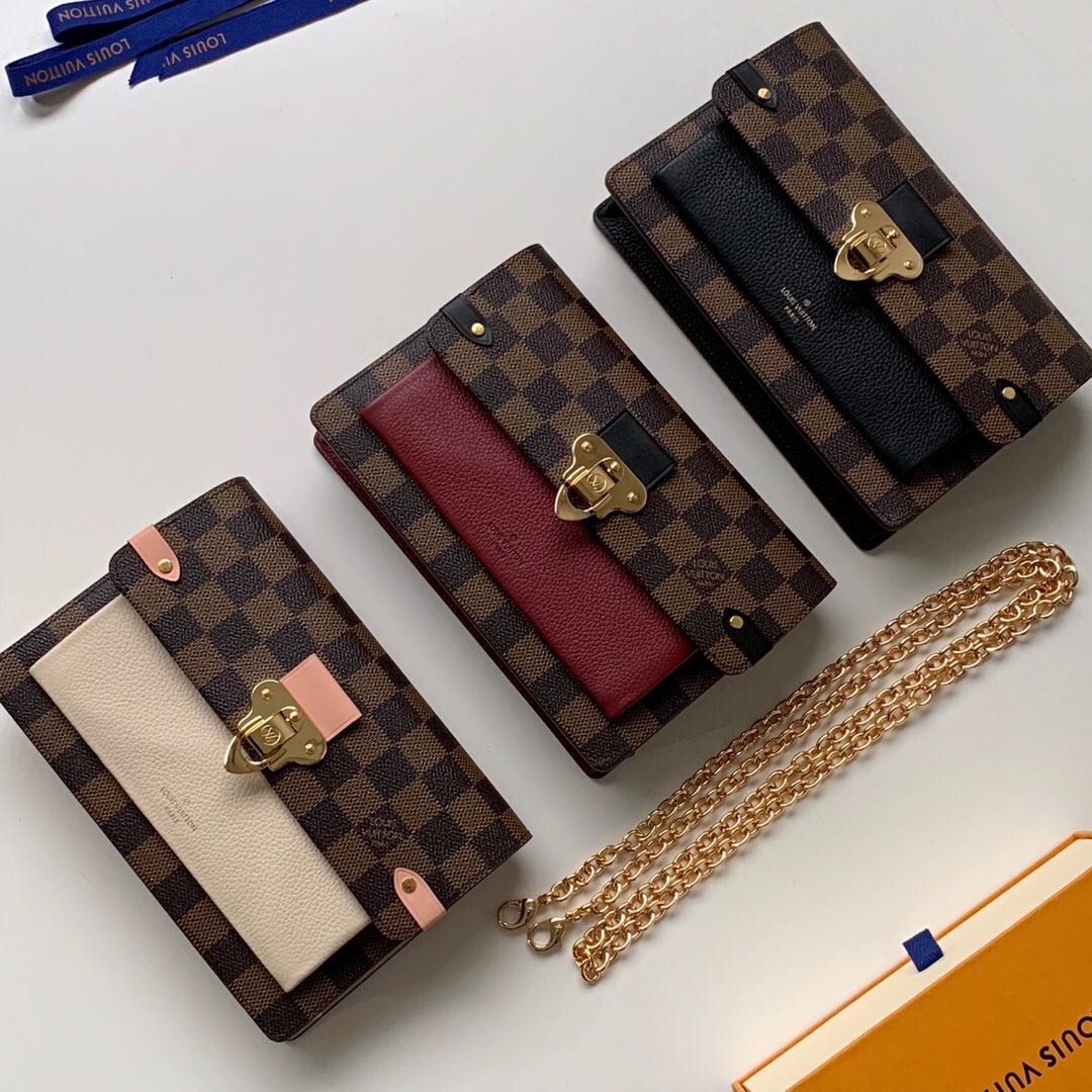 Louis Vuitton Vavin Chain Wallet Nior, Luxury, Bags & Wallets on Carousell