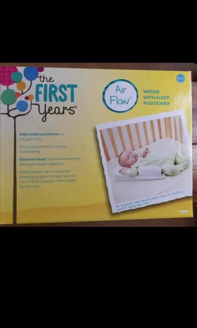 the first years sleep positioner
