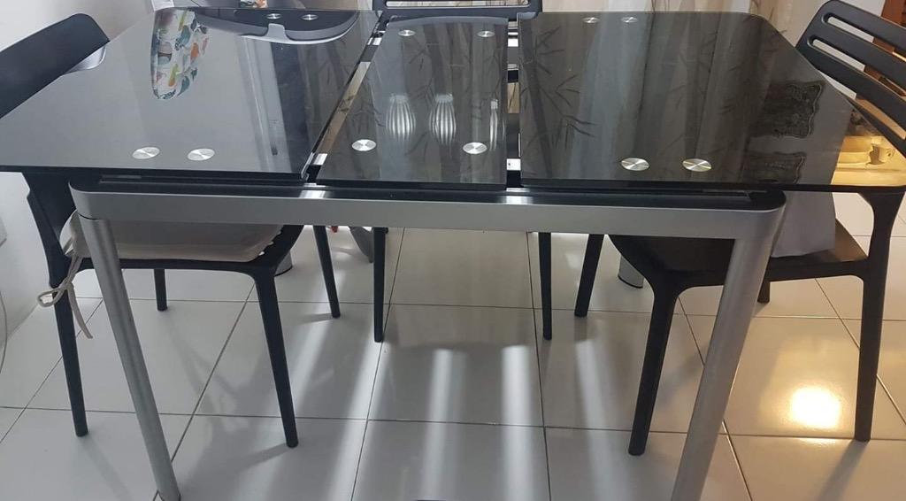 La Sedia 4-6 Extendable Dining Table (Category: Tables & Sets) located in Taguig. Submitted by richardrr_24 (Listing ID 1016613297, Image 2). Description: Pre-loved La Sedia Extendable dining table! Black mirror table top and silver base, elegant looking In good condition, no issues with extending surface table mechanism No cracks whatsoever on dining table surface Used but not abused! L54.5 [6] or 43.5 [4 seater] x W31.5 x H30.5in Excellent addi