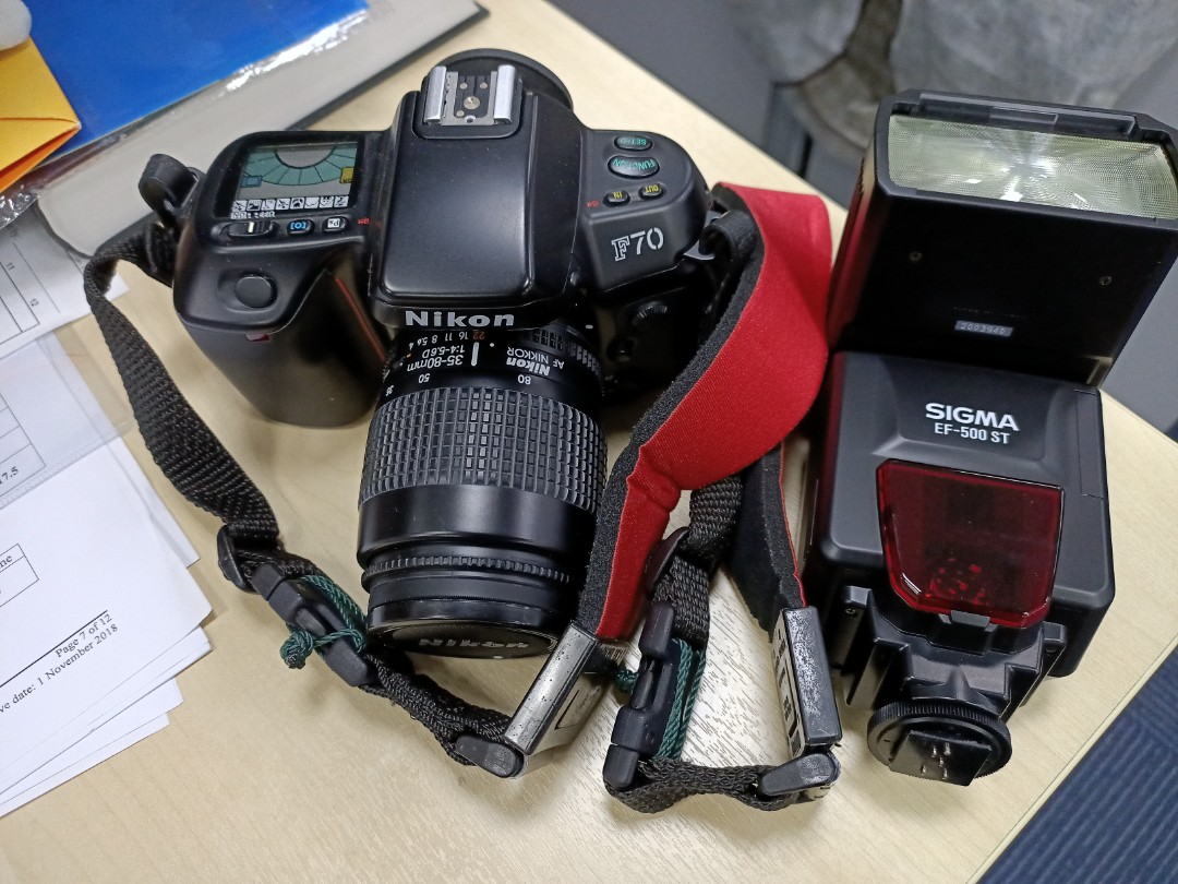 Nikon F70 film with flash, Photography, Cameras on Carousell