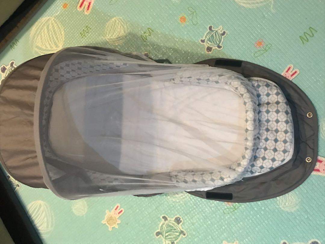 Baby delight Snuggle nest traveler Bl Babies Kids Baby Nursery Kids Furniture Cots Cribs on Carousell