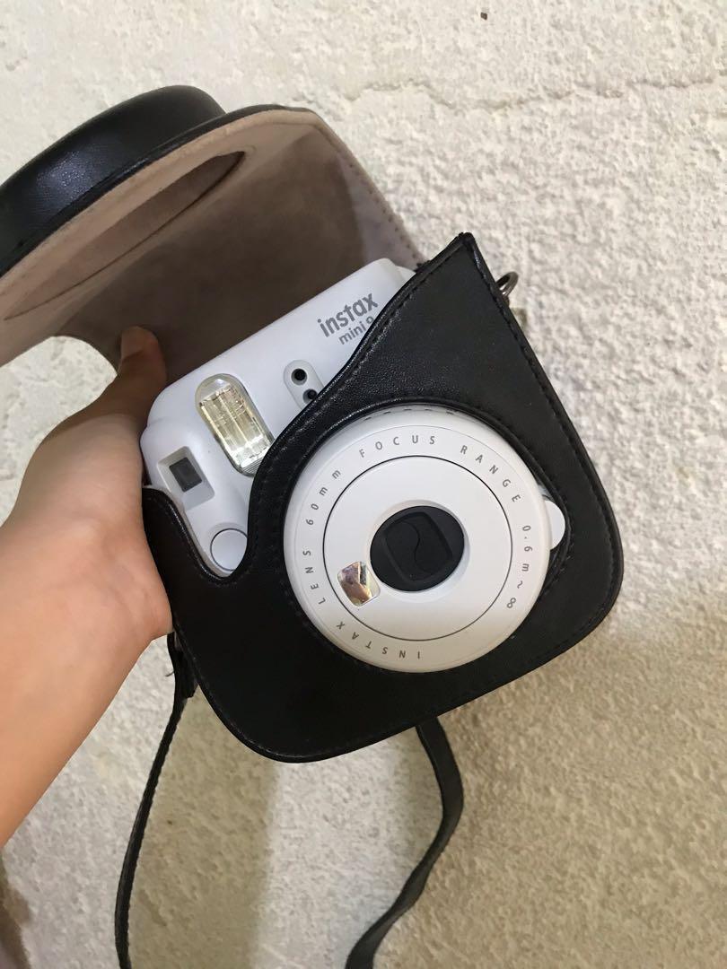 INSTAX MINI 9 WITH LEATHER BAG, BOX AND ADDITIONAL 3 FILMS (Category: Other Photography Accessories) located in Pasay City. Submitted by madmaez (Listing ID 1016752546, Image 1). Description: Fujifilm Instax Mini 9 -Instant Camera -Smokey White w/ additional 3 films w/ black leather bag No to haggling po tayo :) Payment first .