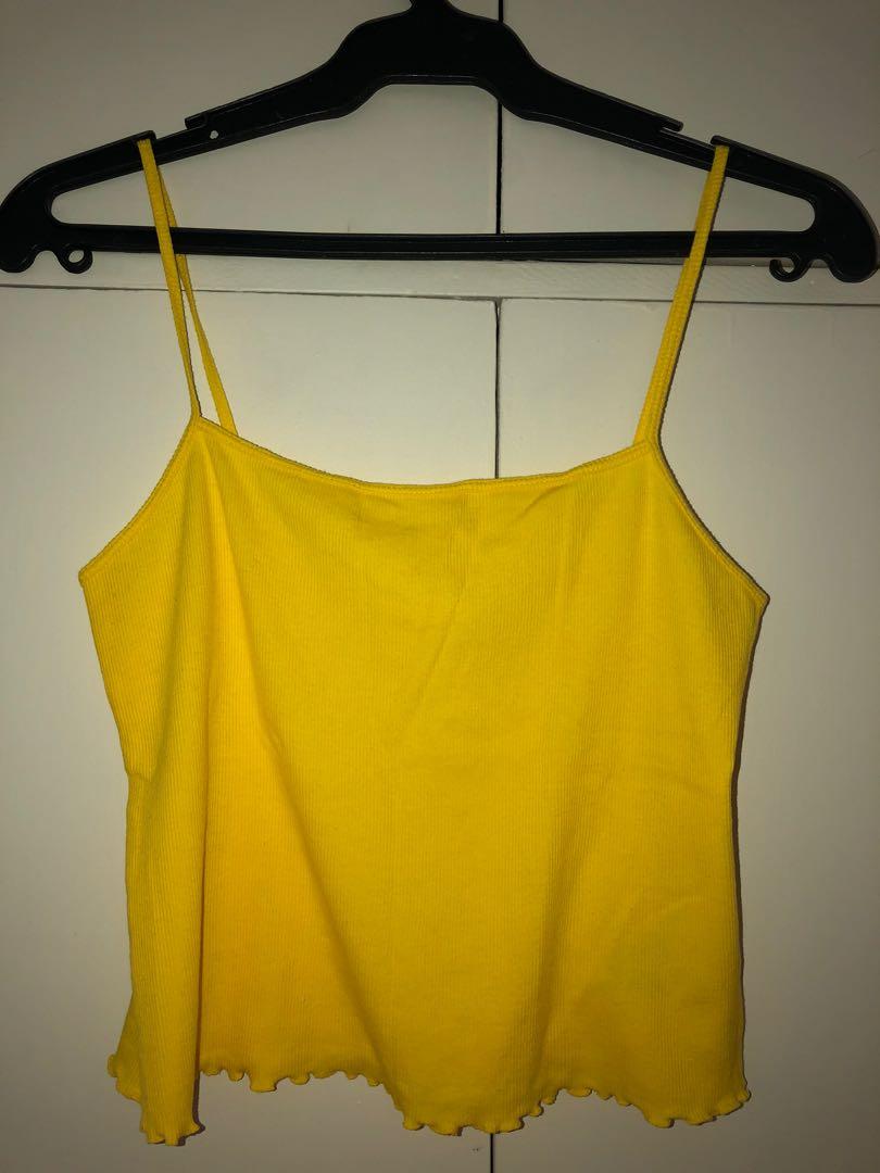 yellow sleeveless crop top