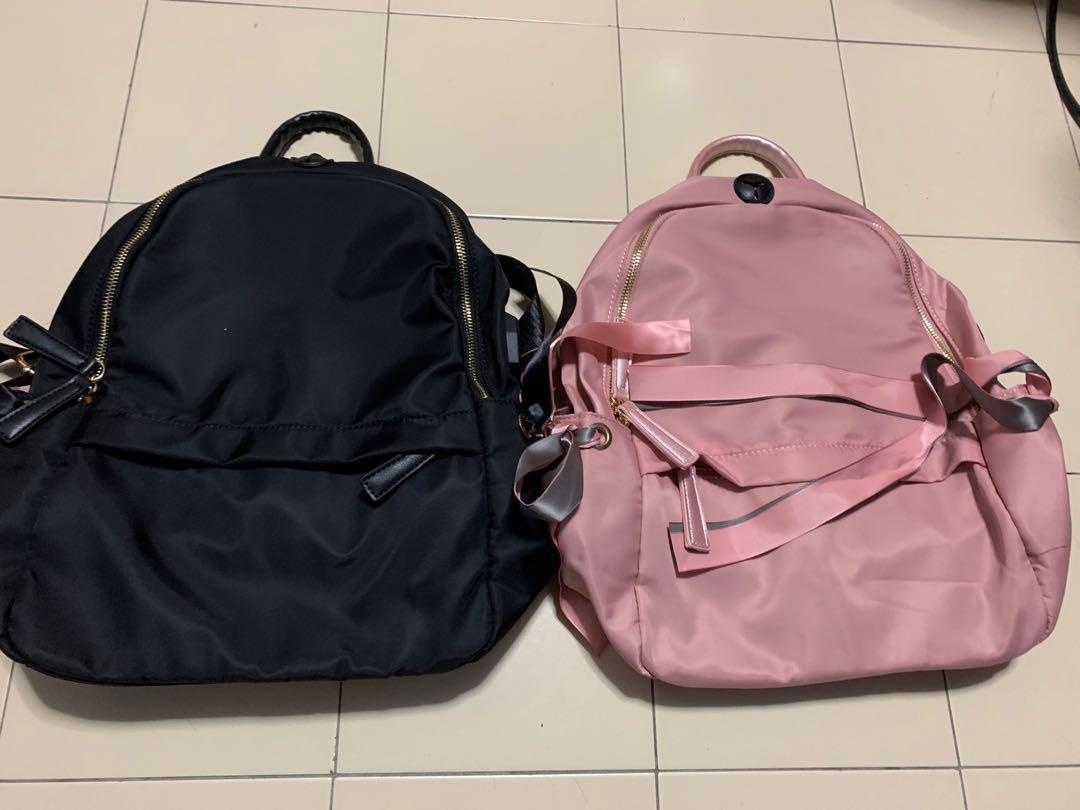 Nylon Backpack (Category: Backpacks) located in Singapore. Submitted by coffee4life (Listing ID 1016834631, Image 1). Description: 1 for $35 Available in Black & Pink.