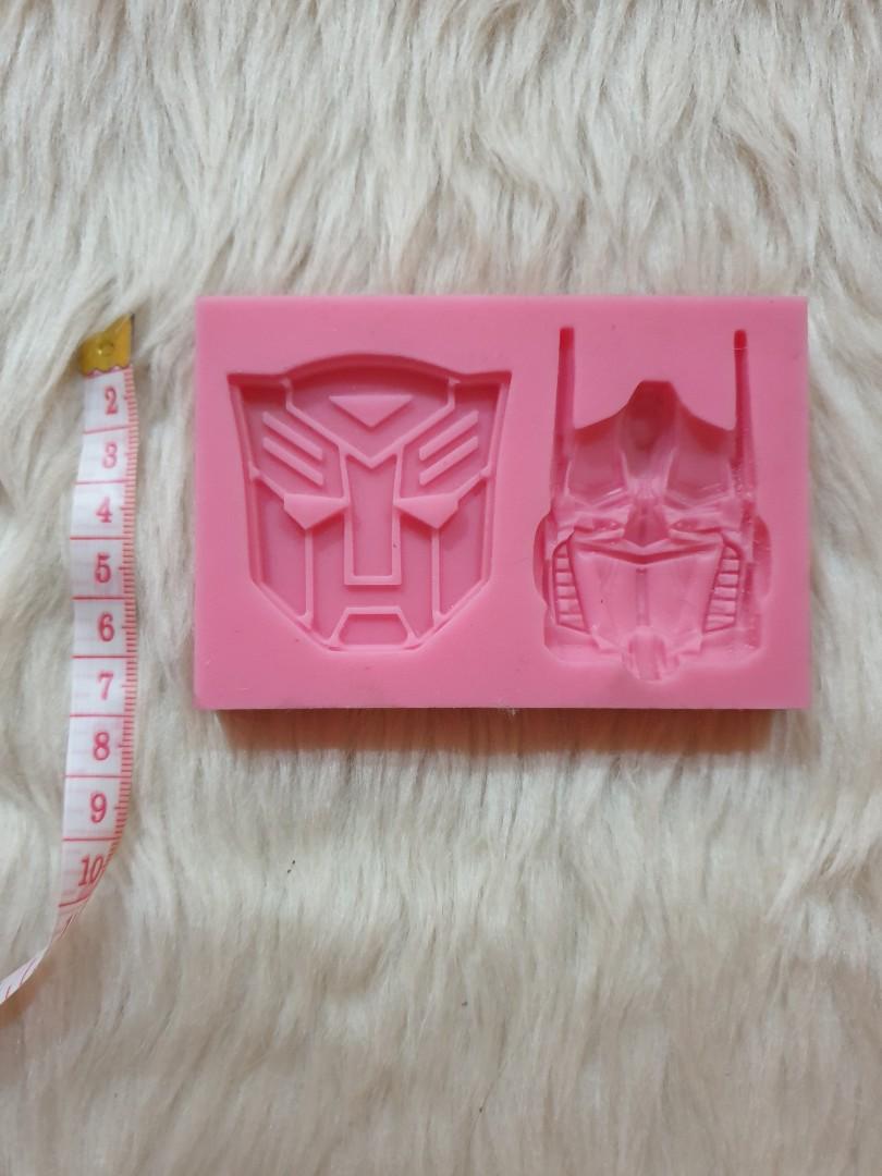 Sillicone Moulds (Category: Bakeware) located in Taguig. Submitted by misskweezy (Listing ID 1016764990, Image 2). Description: PRICE IS FIXED. Lugi na sa shipping. Bento or baking hobby did not push thru. Stored lang. 1. Hello Kitty, My Melody, Lilo & Stitch, Doraemon, Winnie the Pooh (New) - Php 280 2. Hello Kitty Round Small (New/Loose) - Php 120 3. Transformers (New/Loose) - Php 150 4. Random Shapes/Animals (New) - Php 80 Condition: New/Used 