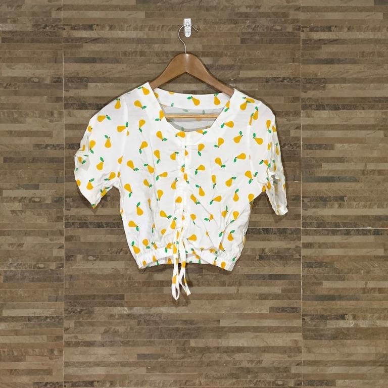 white and yellow crop top