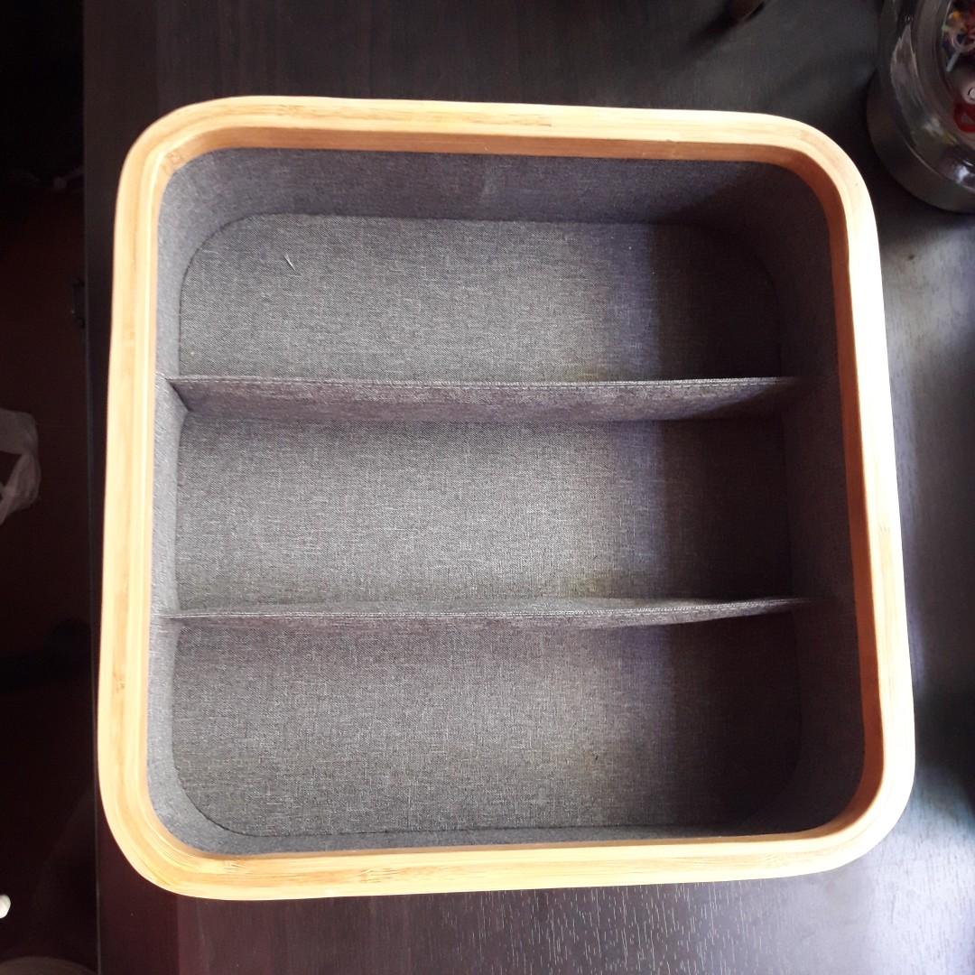 Bamboo frame with fabric Organizer (Category: Storage Boxes & Baskets) located in Manila. Submitted by PickClickShip (Listing ID 1016975500, Image 1). Description: Bamboo frame with fabric organizer An organizer that you can use anywhere, either in your closet, bathroom, kitchen, etc.. - material: bamboo frame and quality fabric - with 2 cushioned division - hard base and wrap in fabric all around - Australian brand - dimension: H3.5 x W12 x L12"