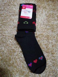 Knee-high rainbow hearts socks