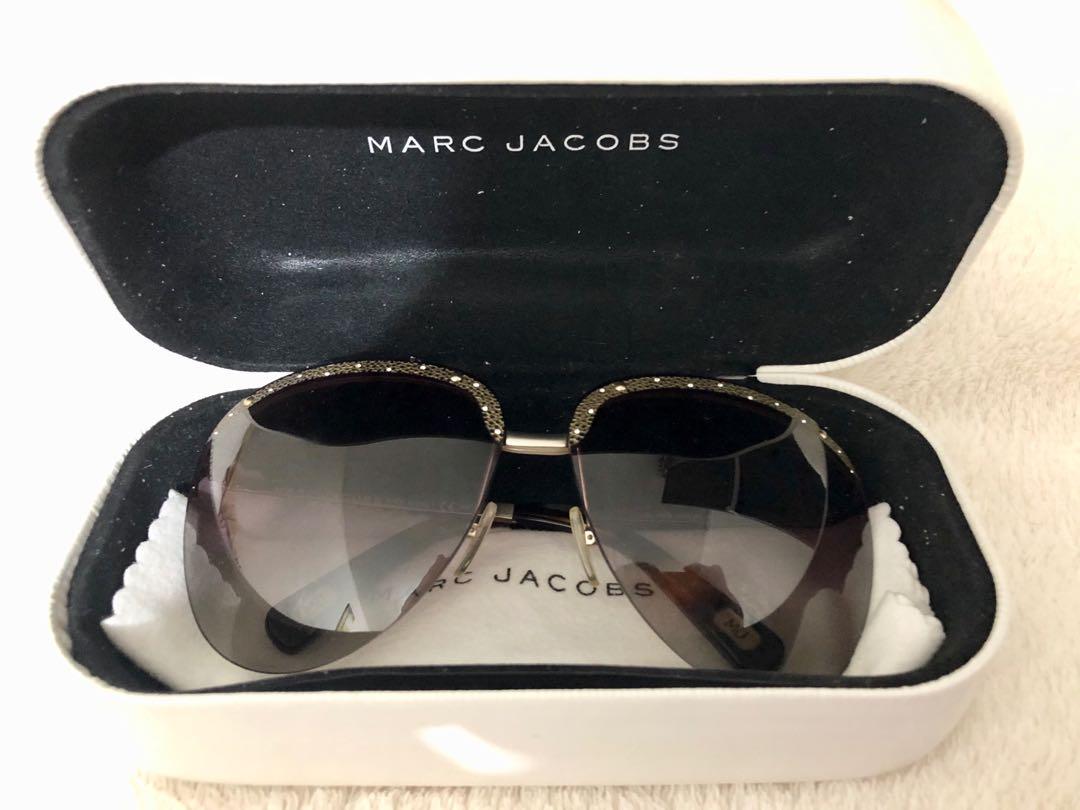 Marc Jacobs Sunglasses / shades luxury shades (Category: Luxury Accessories) located in Manila. Submitted by coolwhale.db3248 (Listing ID 1016973920, Image 3). Description: Excellent condition No flaw Marc jacobs sunglasses With swarovski studs .