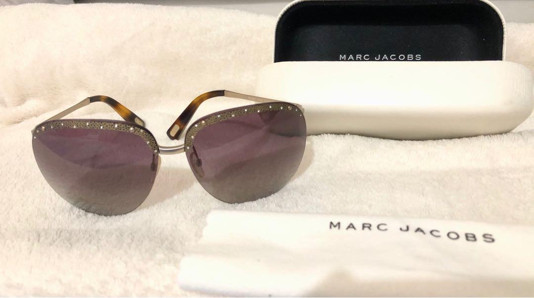Marc Jacobs Sunglasses / shades luxury shades (Category: Luxury Accessories) located in Manila. Submitted by coolwhale.db3248 (Listing ID 1016973920, Image 1). Description: Excellent condition No flaw Marc jacobs sunglasses With swarovski studs .