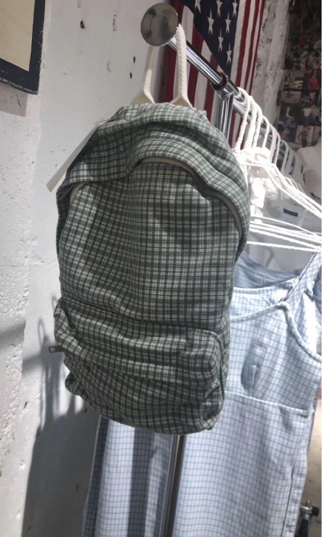 green plaid backpack