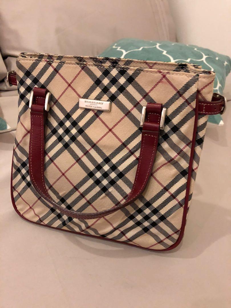 Preloved burberry handbag 100% ORIGINAL (Category: Luxury Bags & Wallets) located in Manila. Submitted by coolwhale.db3248 (Listing ID 1016949608, Image 2). Description: Well used Excellent condition Burberry mini hand bag No stain No flaw .