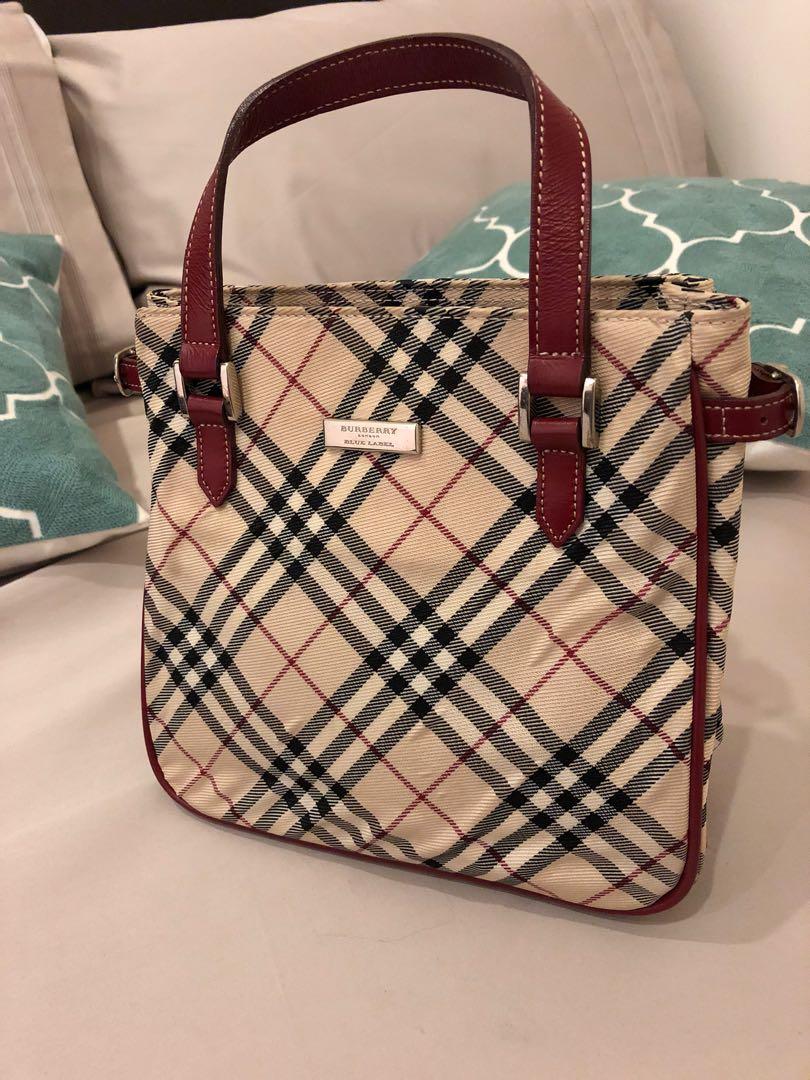 Preloved burberry handbag 100% ORIGINAL (Category: Luxury Bags & Wallets) located in Manila. Submitted by coolwhale.db3248 (Listing ID 1016949608, Image 3). Description: Well used Excellent condition Burberry mini hand bag No stain No flaw .