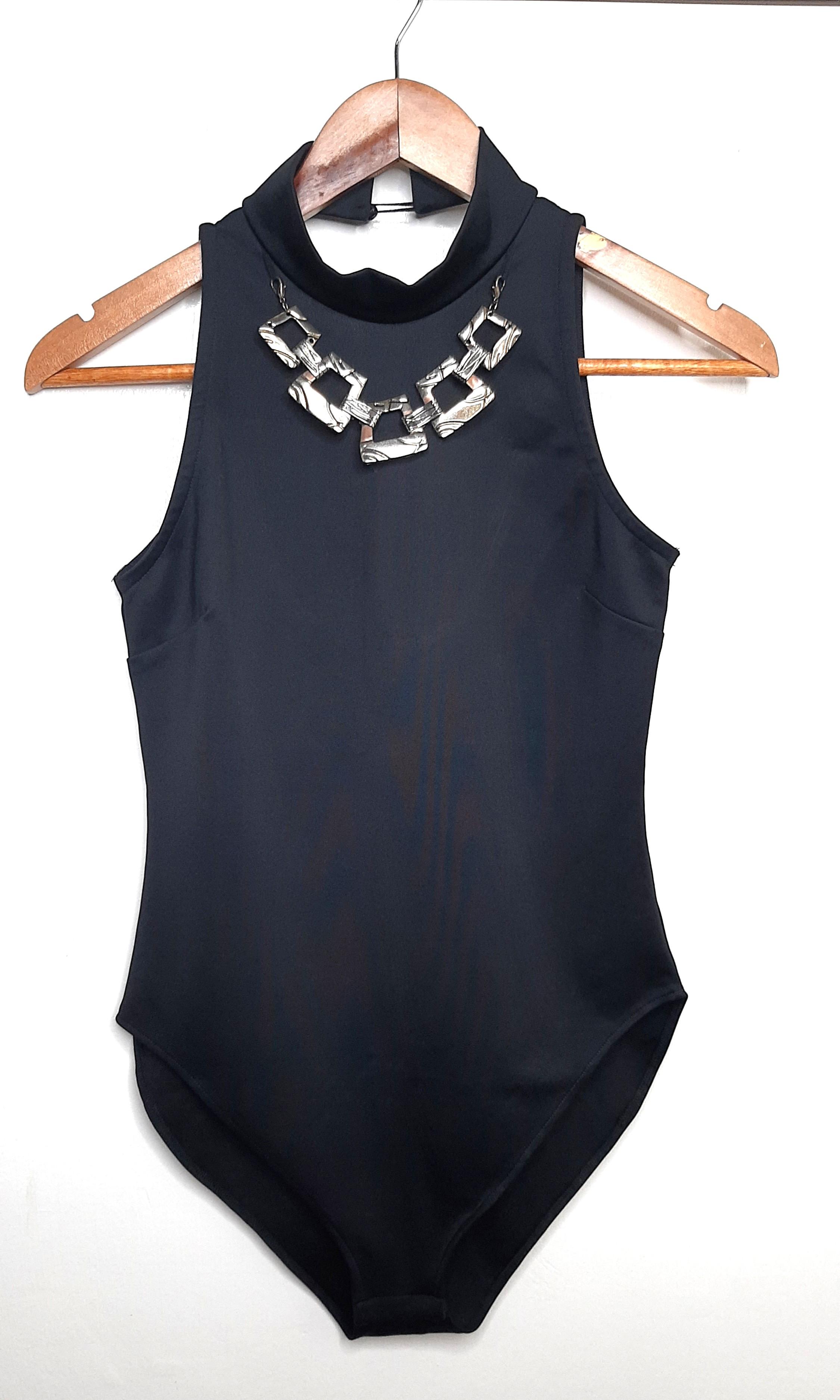 Rhode Island Bodysuit with built in necklace accessory (Category: Jumpsuits) located in Los Banos. Submitted by yannymae (Listing ID 1017122634, Image 1). Description: Sleeveless bodysuit with snap button at the crotch area. Nice fabric..