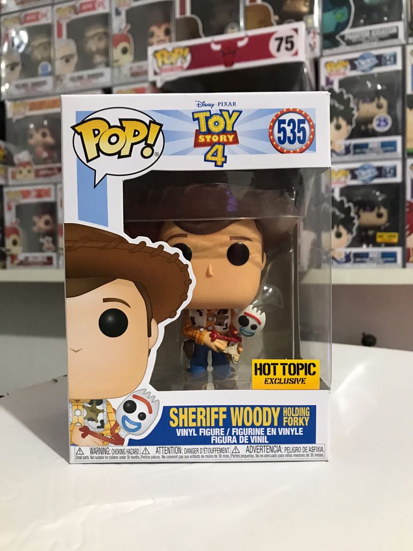Funko Pop Sheriff Woody holding Forky