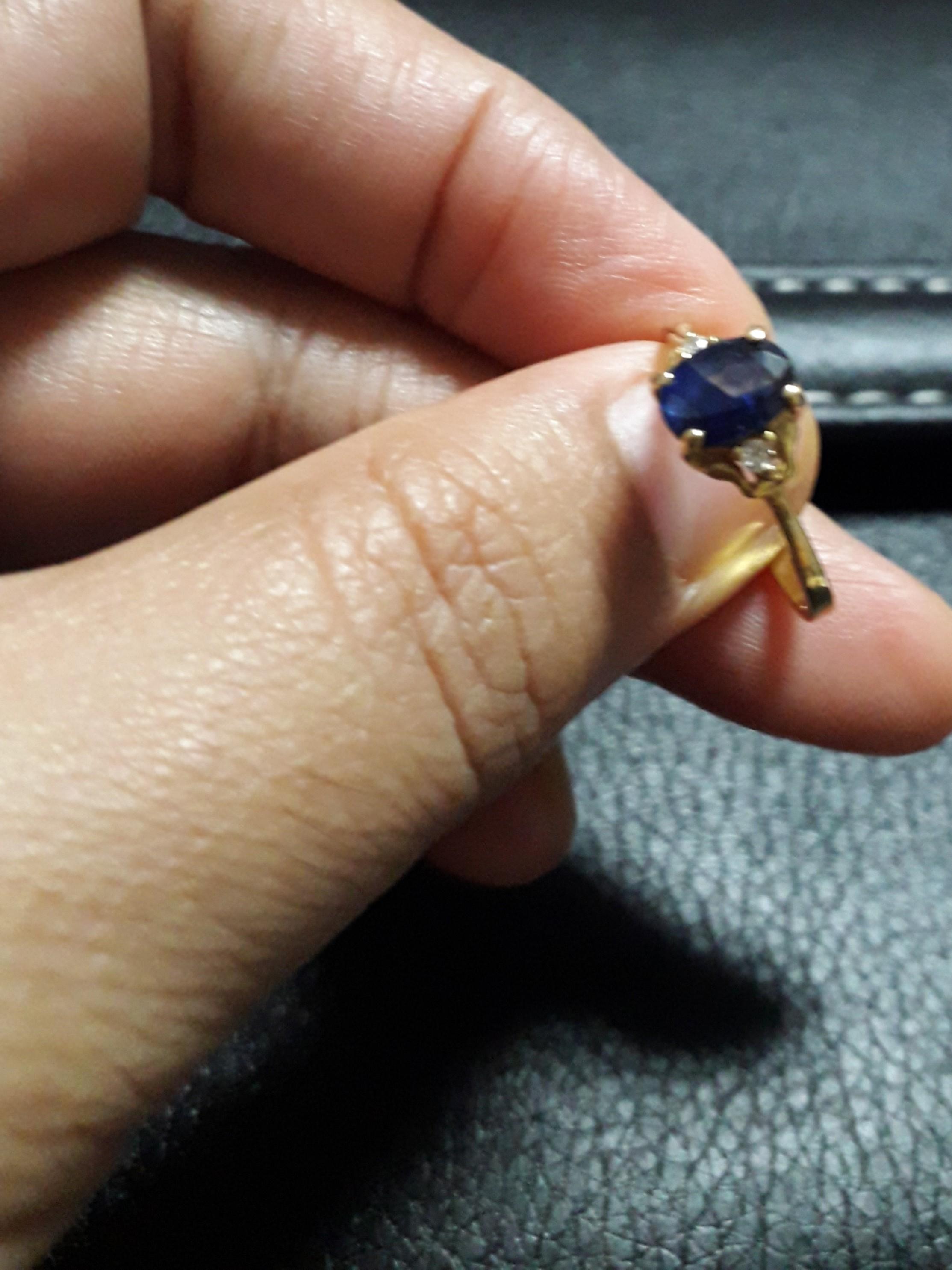 Gold ring with light blue stone best sale