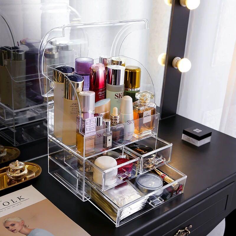 Acrylic Overall Makeup Cosmetic Vanity Organizer (Category: Makeup) located in Manila. Submitted by winterbliss (Listing ID 1017354859, Image 1). Description: Color: Transparent Materials: Acrylic Size: - Regular: L:24 * W:16 * H: 32 (cm) - Large: L:30 * W:17.5 * H: 35.5 (cm) Weight: 1.39kg Shape: - Descriptions: - Serves as cosmetic, makeup, skincare, organizers.