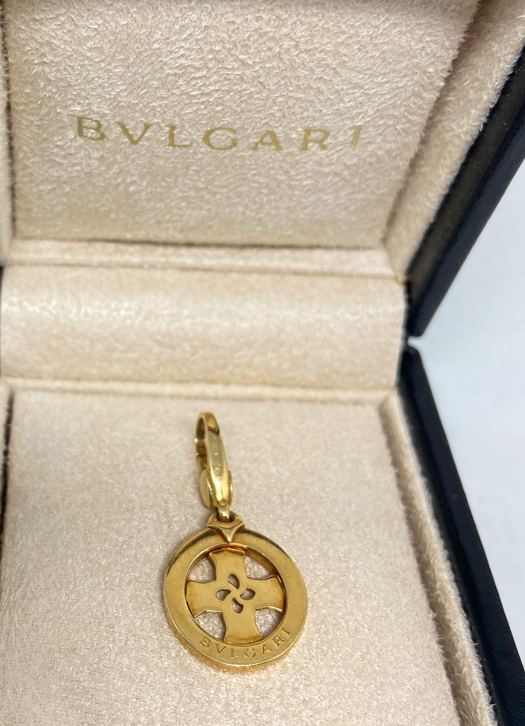 Authentic Bvlgari 18K Tondo Cross Charm/Pendant (Category: Necklaces) located in Quezon City. Submitted by branded_luxe (Listing ID 1017311583, Image 2). Description: Authentic or money back never worn 18K Yellow Gold Cross Charm Pendant from Bulgari's Tondo collection. Measures 29mm by 14 mm and has a hinged bail that opens to fit up to 4 mm. Comes with original Bvlgari box and outer box. Stored new. For faster transaction, (0961) 079 0225.