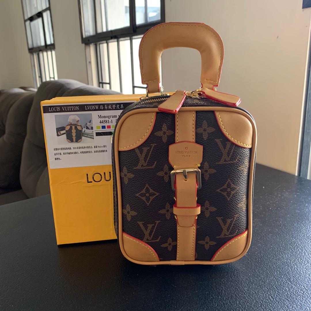 Louis Vuitton Vertical Mini Luggage Bag