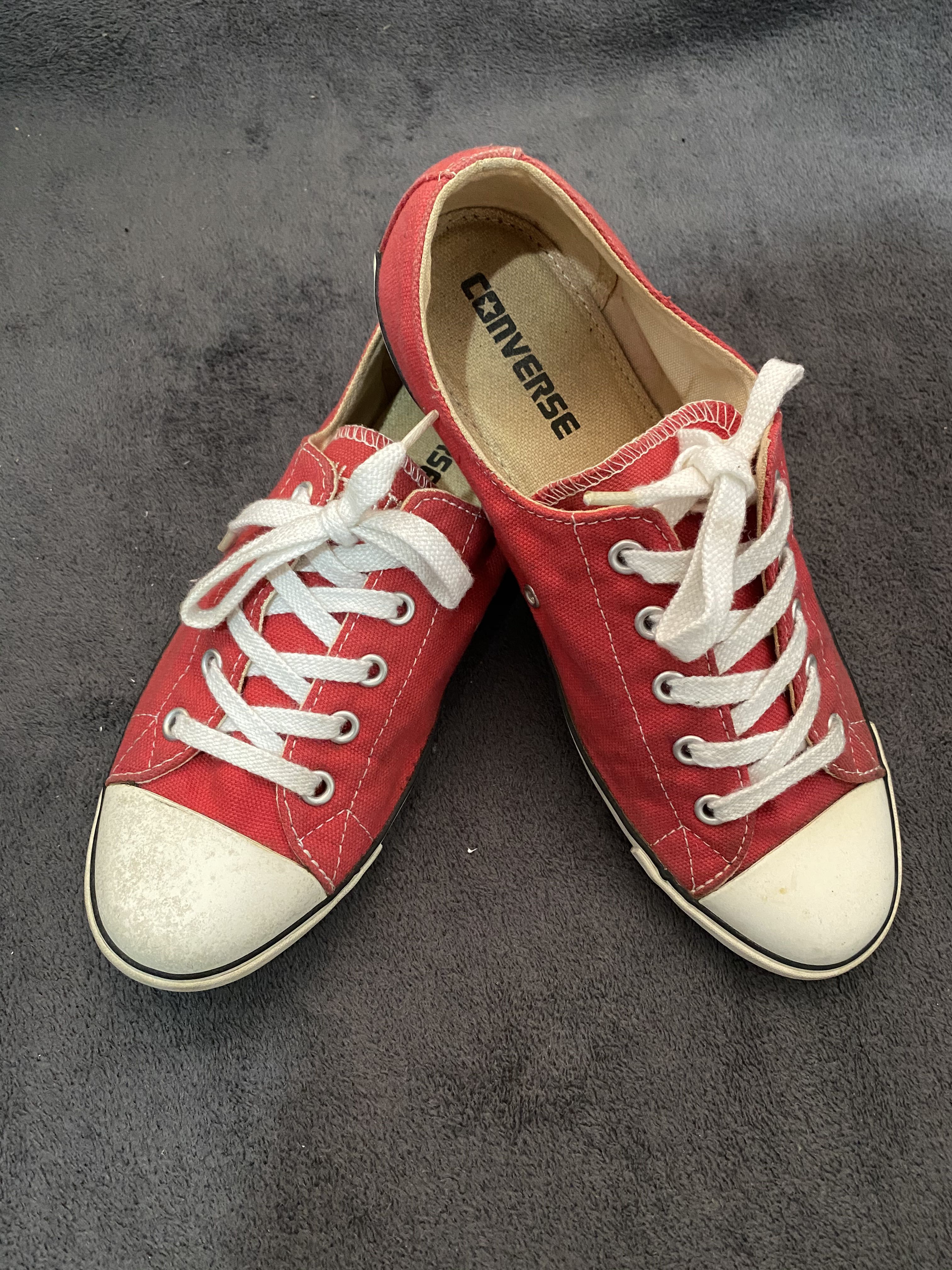 white and red chuck taylors