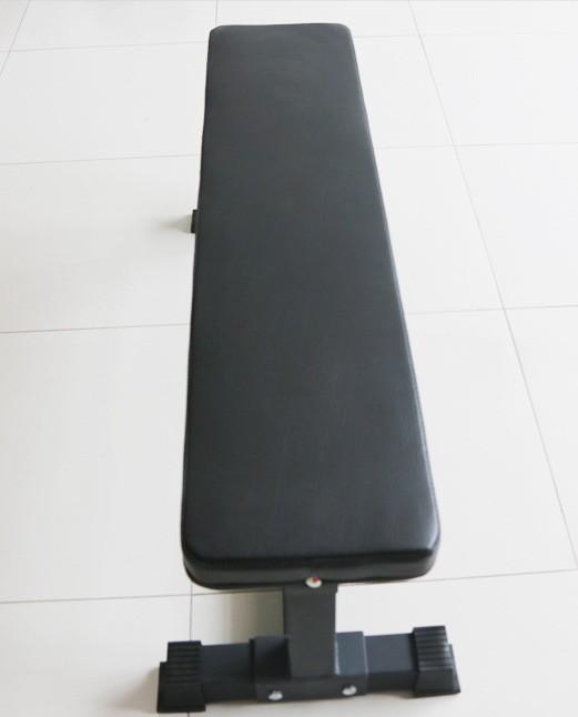 Workout Flat Bench (Category: Cardio & Fitness Machines) located in Singapore. Submitted by tribalfitness (Listing ID 1017326085, Image 2). Description: Flat workout bench Heavy duty steel. Black powder coating is resistant to rust, cracking and peeling of paint works. Rubber base protect flooring. Specs: 65*65*3mm steel Weight :30 KG Dimension : 120*40*28cm ( L*W*H ) 7cm pad thickness Max load: 250kg Installation:$30.