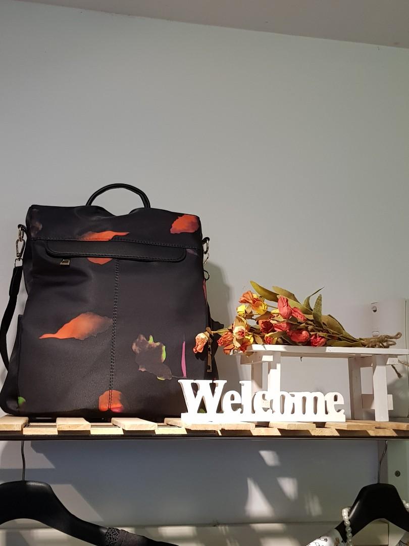 zip around back detail backpack