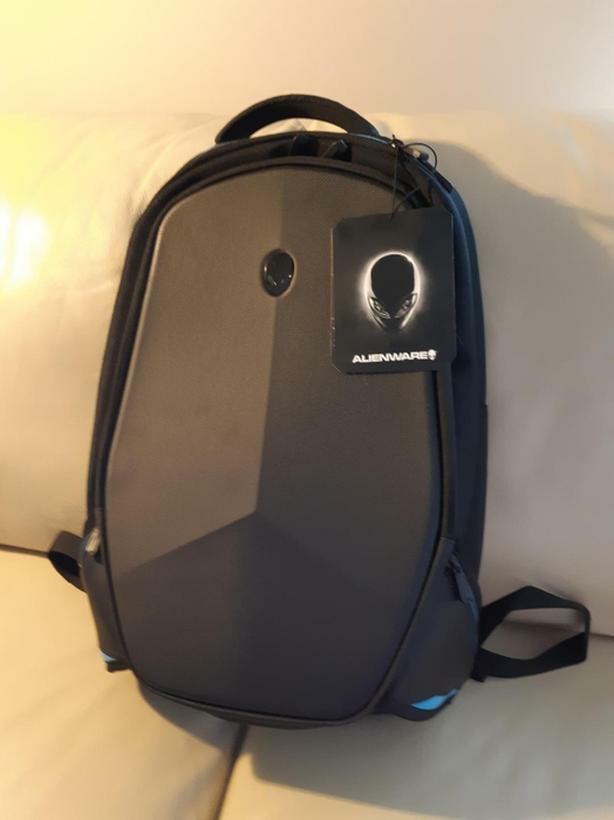 Alienware Bag (Category: Computer Parts) located in Singapore. Submitted by mkern (Listing ID 1011482974, Image 1). Description: Brand new. For 13-16 inch laptop. This is the newer version V2. It has tough shell on its outer surface for protection purposes. Inside has many layers to put things. there is another small bag inside as well..