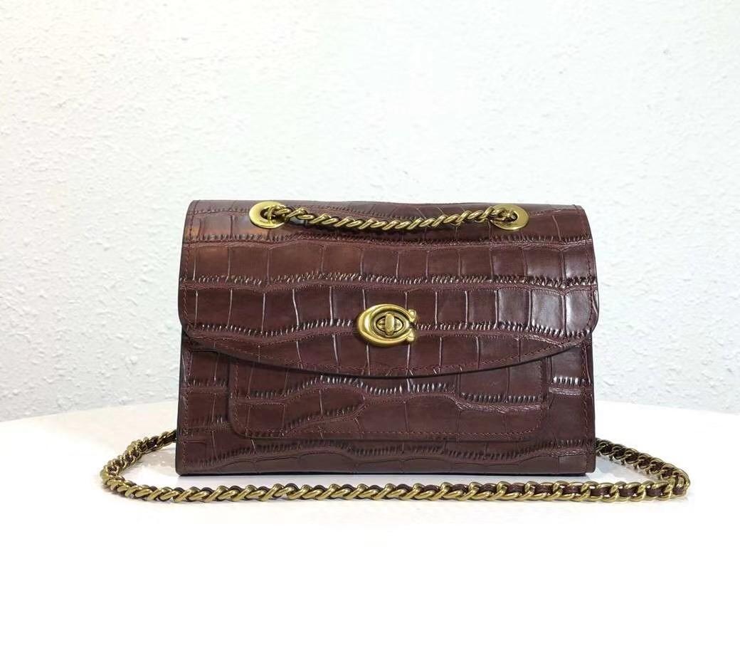 Coach parker plum top