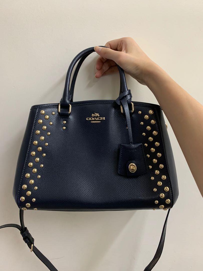 dark blue coach purse