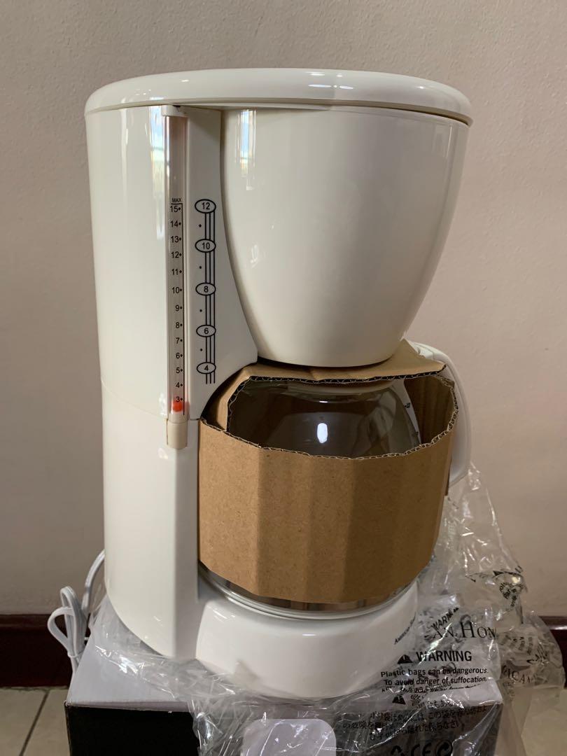 Coffee Maker <1.4 Liters ~12 cups> (Category: Coffee Machines & Makers) located in Quezon City. Submitted by openstorage (Listing ID 1011523566, Image 3). Description: White coffee maker. Easy to use, anti-drip function, thermal glass jar with easy grip handle, automatic keep-warm plate. Bought 1-2 years ago. RFS: no need for it :).