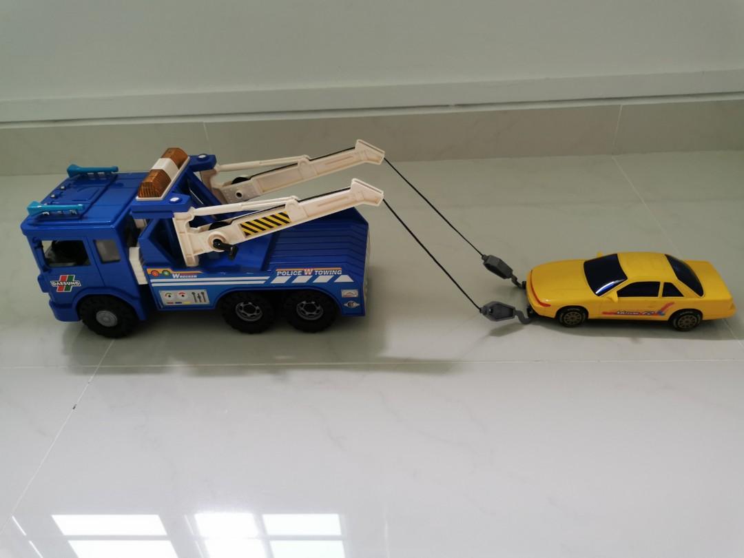 toy tow truck with car