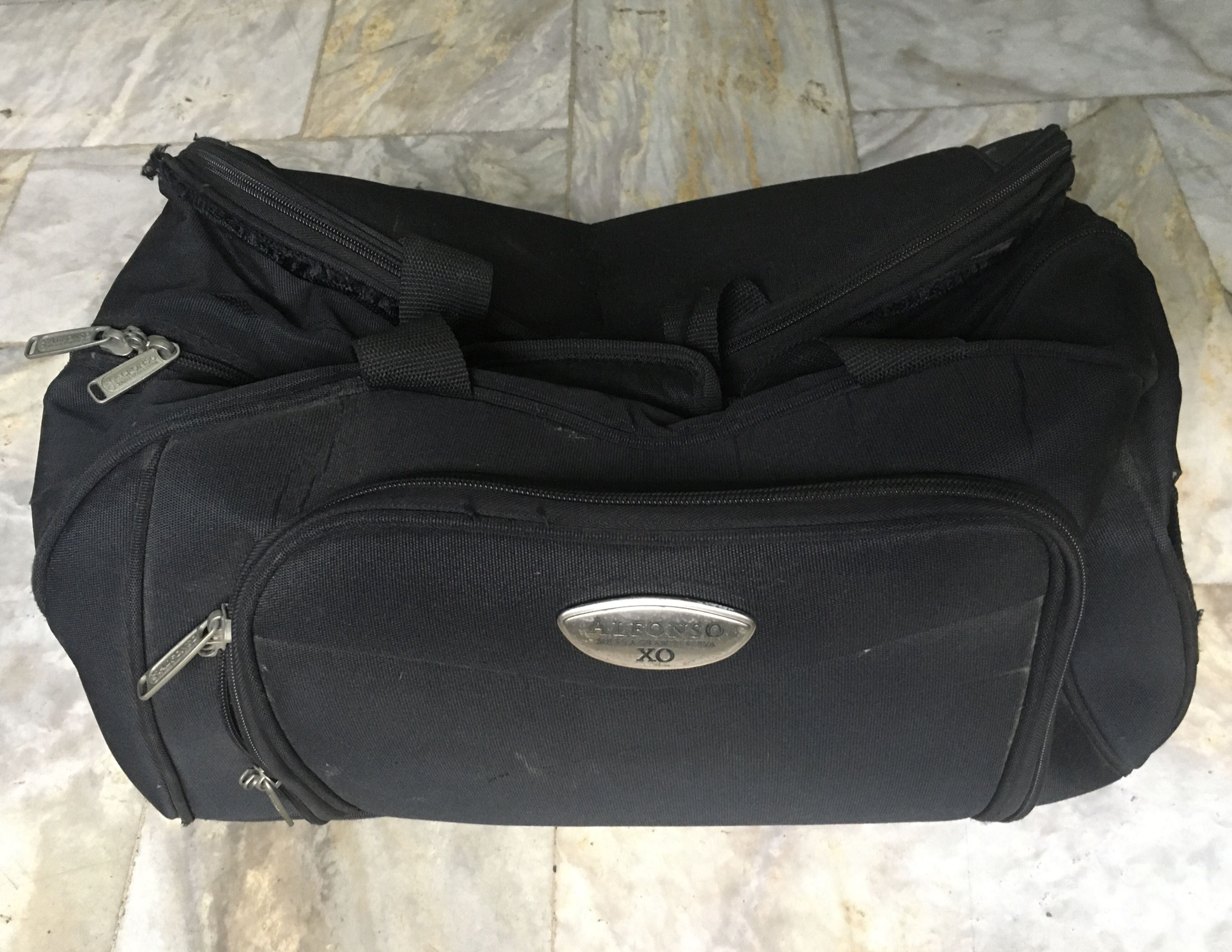 black leather luggage bag