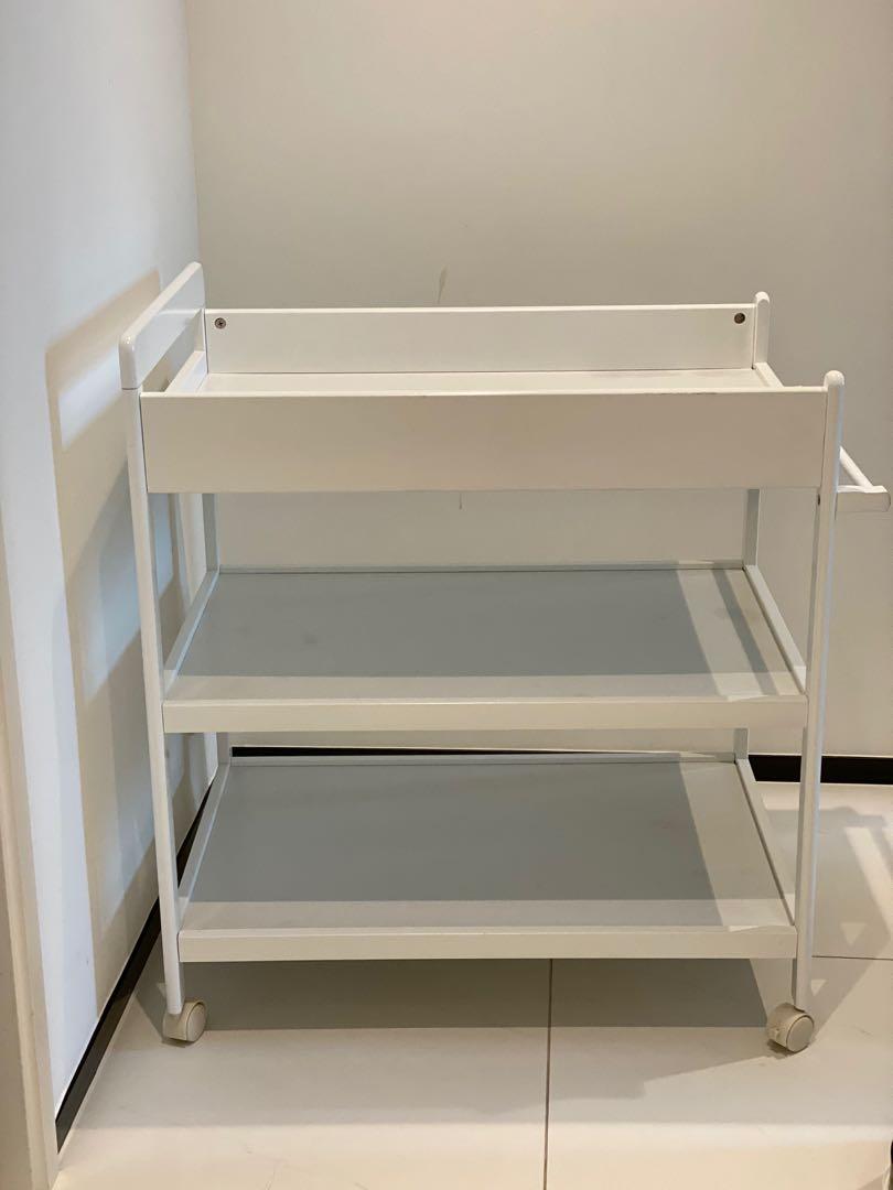 white wooden changing table