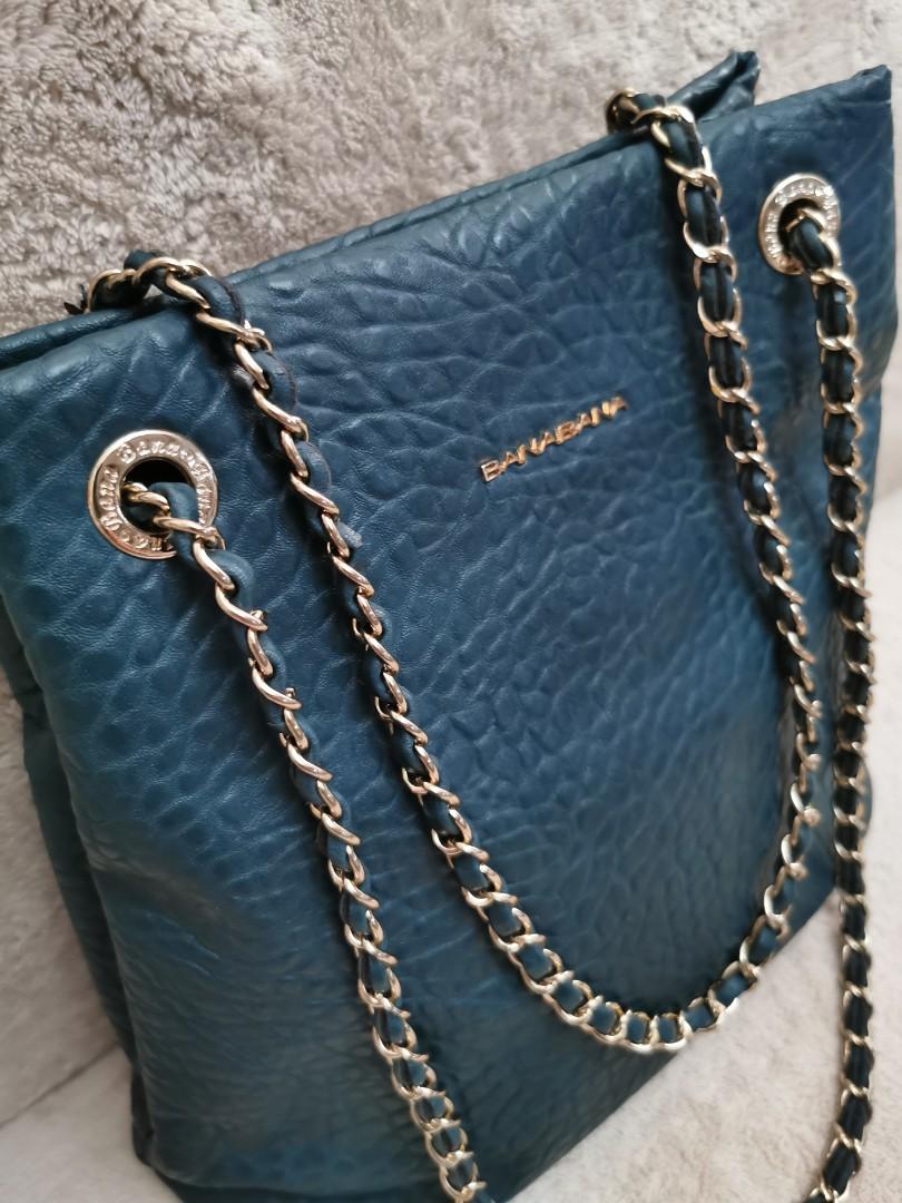 Banabana Chain Sling Bag (Category: Beach Bags) located in Pasig City. Submitted by chichirepublic (Listing ID 1011932304, Image 2). Description: Preloved Banabana Chain Sling bucket bag in like new condition. No flaws, no issues. Guaranteed original..