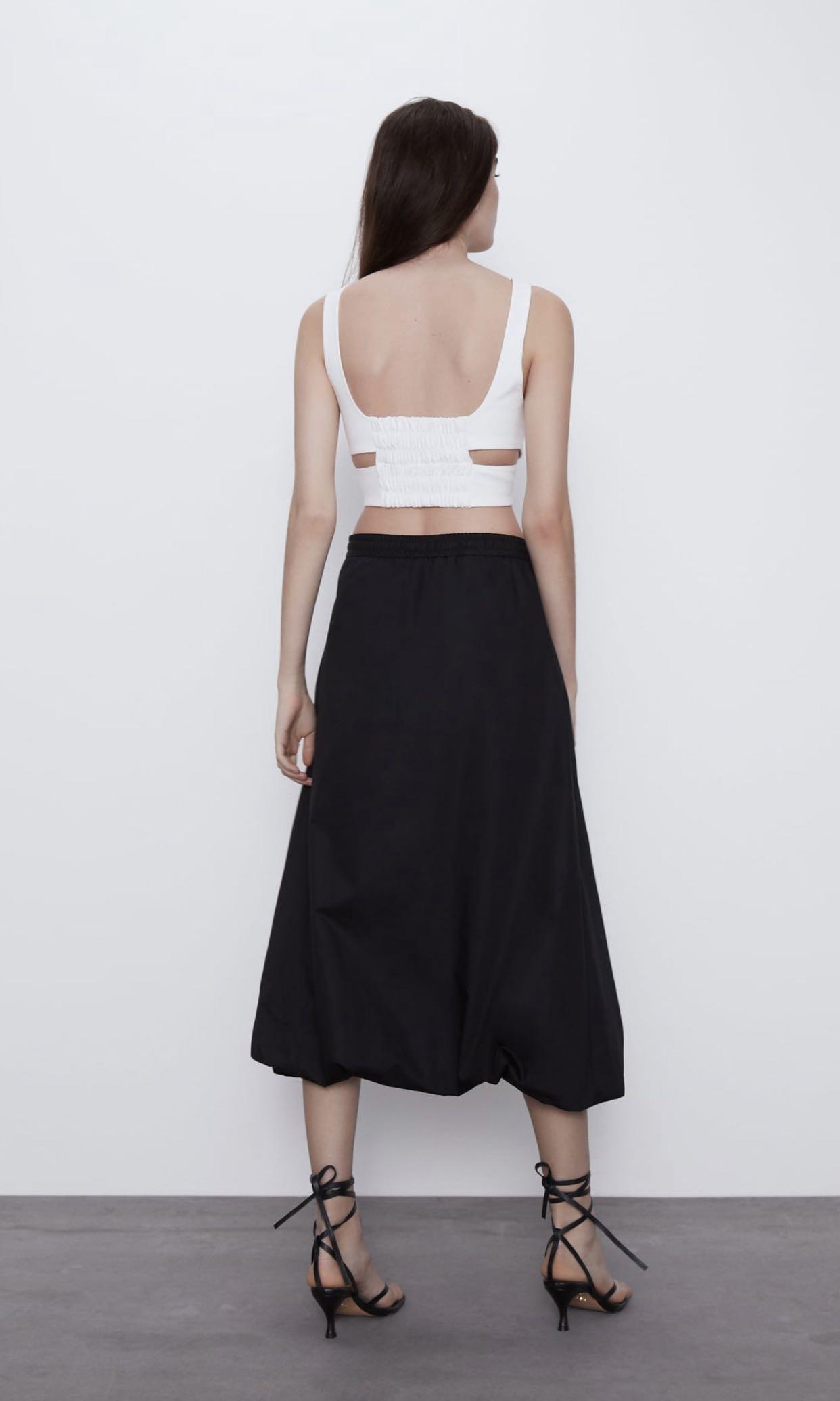 BNWT Zara cut out crop top (Category: Sleeveless) located in Makati City. Submitted by madclutter (Listing ID 1011951152, Image 2). Description: Brand new with tag! Has nice fabric in actual! Garterized yung back Sizes available: Medium.