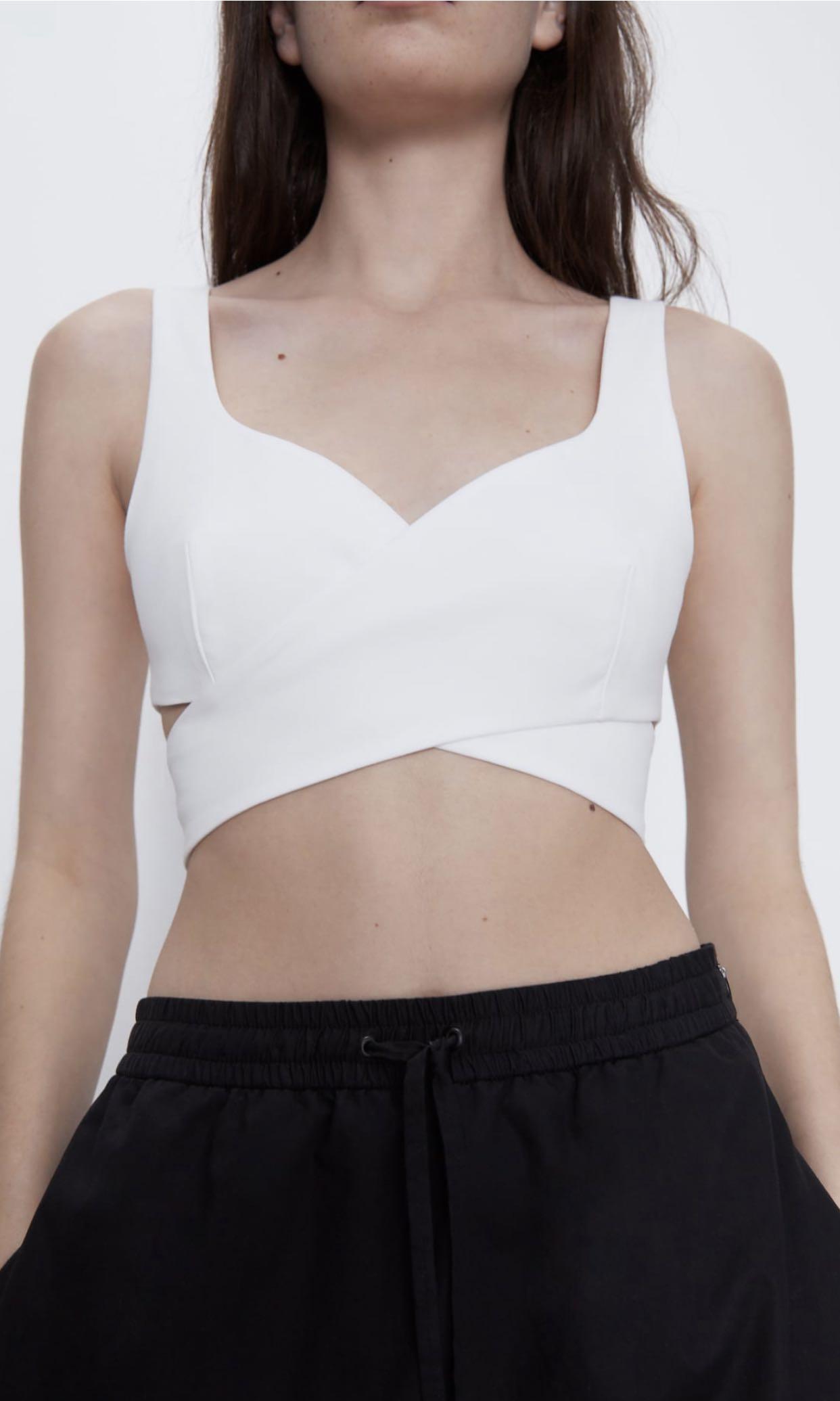 BNWT Zara cut out crop top (Category: Sleeveless) located in Makati City. Submitted by madclutter (Listing ID 1011951152, Image 3). Description: Brand new with tag! Has nice fabric in actual! Garterized yung back Sizes available: Medium.