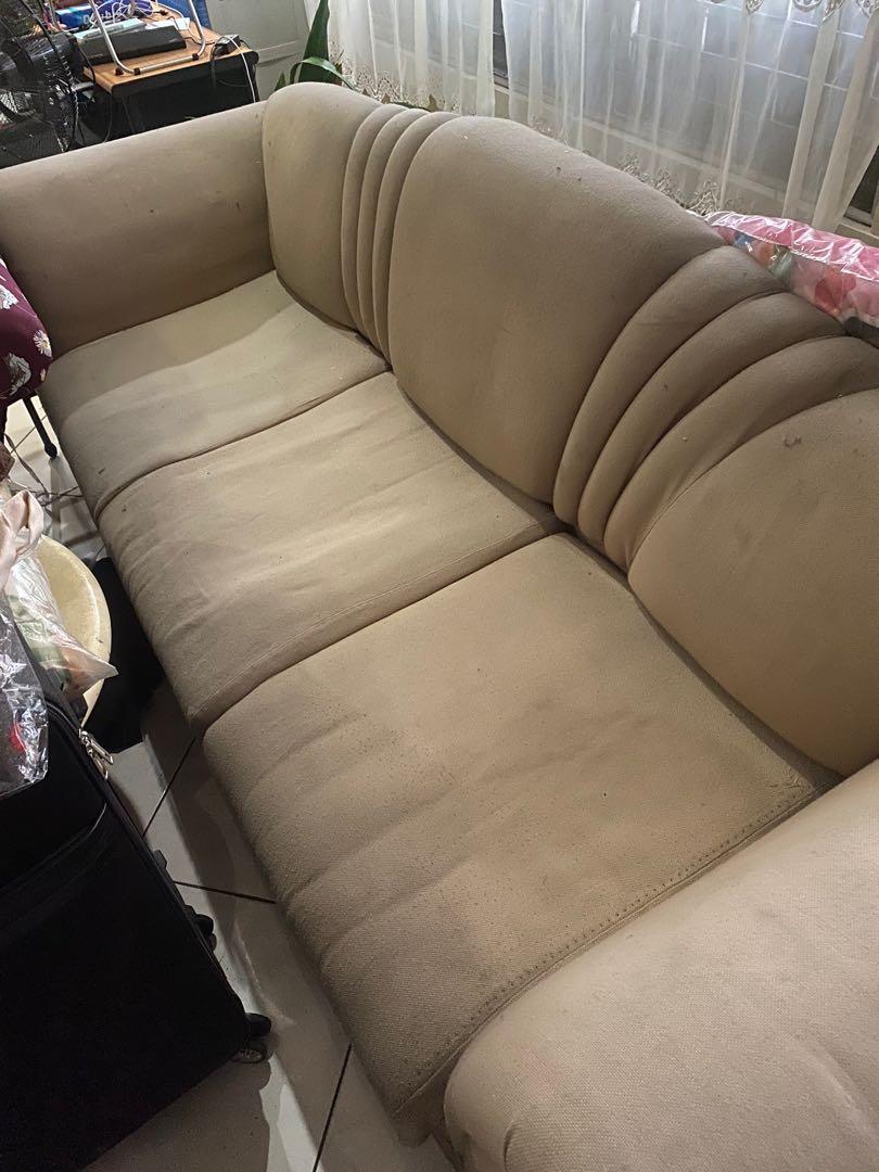 Long Brown Sofa (Category: Sofas) located in Manila. Submitted by closetcleanup16 (Listing ID 1011875526, Image 1). Description: ❤️Long comfortable sofa, rarely used ❤️Easy to maintain fabric upholstery ❤️Can easily fit 5 people Dimensions: 92 inches - length 32 inches - height 32 inches - width ISSUES: Needs cleaning or shampoo, seat cushions a bit stiff but no holes or tears in the fabric .