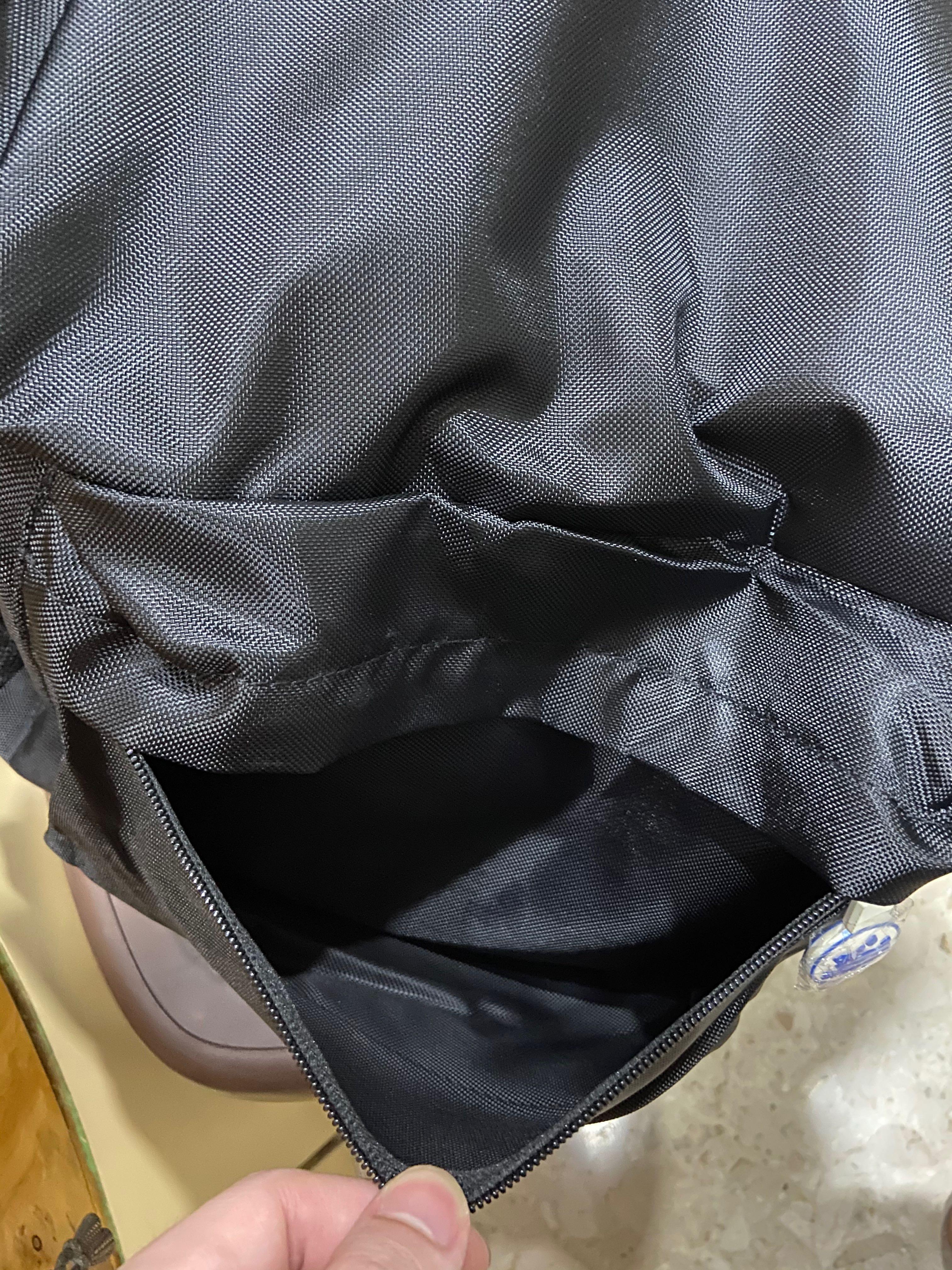 Transformable backpack (Category: Backpacks) located in Singapore. Submitted by pineabbleee (Listing ID 1011803479, Image 4). Description: COMPLETELY BRAND NEW - lightweight - can be transformed into a sling bag (see instructions) - sizeable and good for travelling .