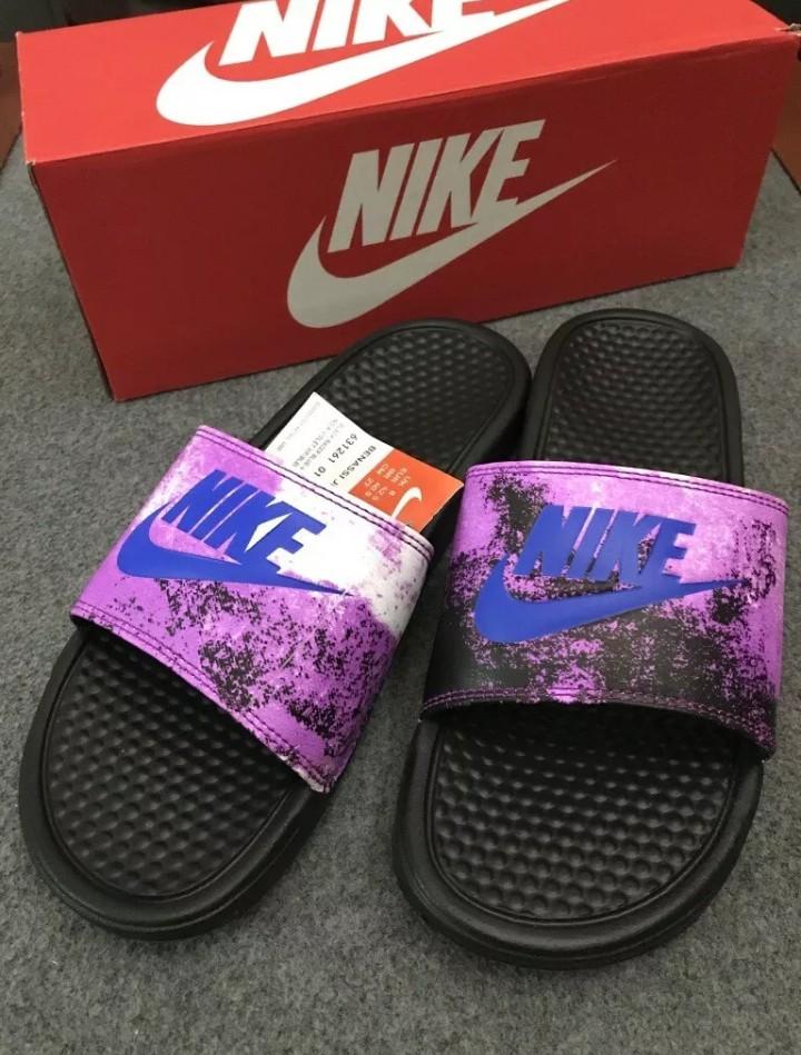 purple nike sandals with gold check