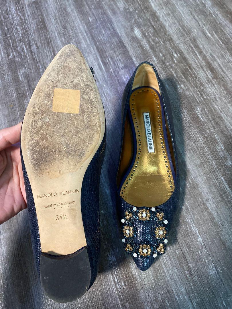 Authentic Manolo Blahnik Flats (Category: Flats & Sandals) located in Quezon City. Submitted by abbynf (Listing ID 1012415343, Image 3). Description: Selling my preloved authentic Manolo Blahnik flats metallic blue. Size 34 1/2. Almost new. Used only twice. Comes with box and dustbag RFS : a bit small for me.