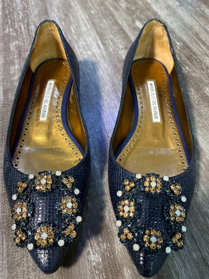 Authentic Manolo Blahnik Flats (Category: Flats & Sandals) located in Quezon City. Submitted by abbynf (Listing ID 1012415343, Image 1). Description: Selling my preloved authentic Manolo Blahnik flats metallic blue. Size 34 1/2. Almost new. Used only twice. Comes with box and dustbag RFS : a bit small for me.