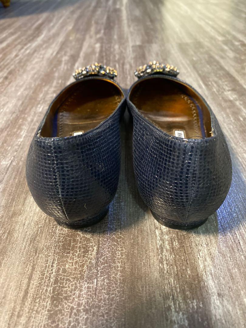Authentic Manolo Blahnik Flats (Category: Flats & Sandals) located in Quezon City. Submitted by abbynf (Listing ID 1012415343, Image 2). Description: Selling my preloved authentic Manolo Blahnik flats metallic blue. Size 34 1/2. Almost new. Used only twice. Comes with box and dustbag RFS : a bit small for me.
