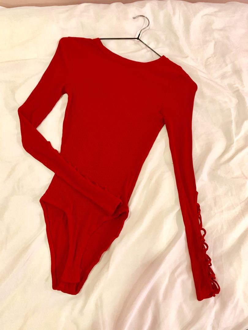 Bershka criss cross bodysuit (Category: Sleeveless) located in Quezon City. Submitted by styledmanila (Listing ID 1012293074, Image 1). Description: -fits xs to s -stretchable .