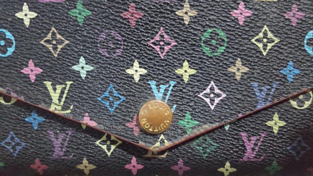 LV multicolored long wallet (Category: Luxury Bags & Wallets) located in Baguio. Submitted by lotus_blossom (Listing ID 1012206634, Image 2). Description: LV multicolored logo wallet NO CODE Not guaranteed see posted flaws Exclusive JRS Shipping.