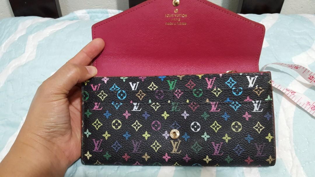 LV multicolored long wallet (Category: Luxury Bags & Wallets) located in Baguio. Submitted by lotus_blossom (Listing ID 1012206634, Image 3). Description: LV multicolored logo wallet NO CODE Not guaranteed see posted flaws Exclusive JRS Shipping.