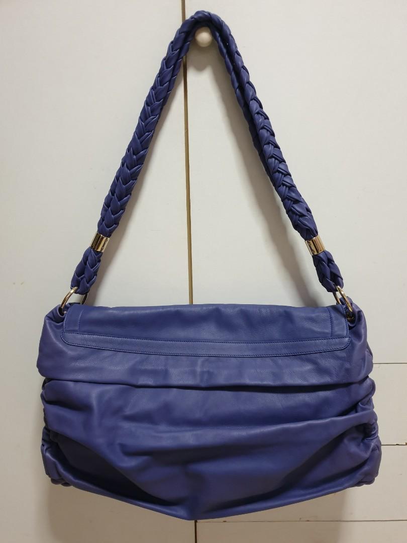 Purple leather messenger bag store