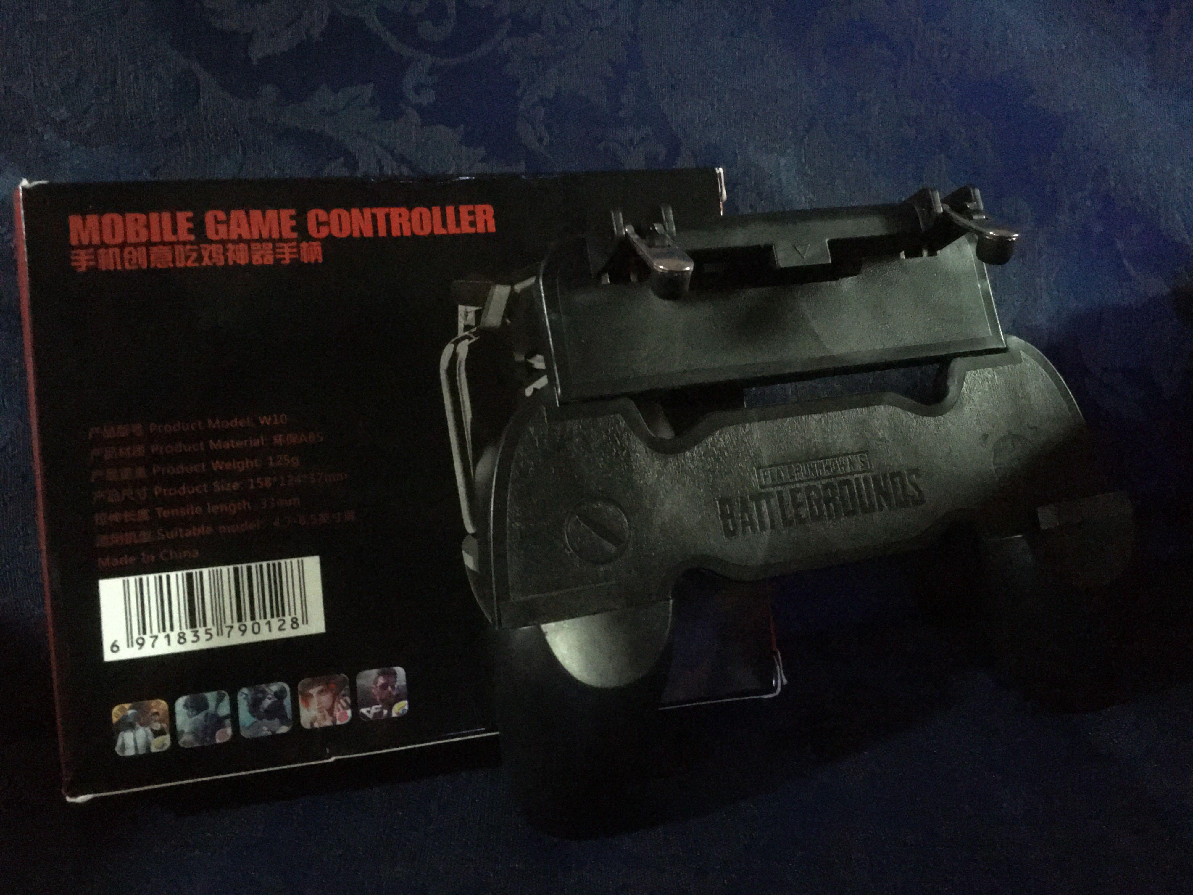 W10 Mobile game controller (Category: Controllers) located in Manila. Submitted by dl_online_shop (Listing ID 1012275644, Image 1). Description: Accessory Type : Smart Phone Gaming Controller Brand : Other Compatible with : Mobile Phones Descriptions: Made of high quality material, ergonomic design, very durable. Flexibility, precision, comfort, easy to control. Compact and portable. Single point support on the top of the phone card slot can effe
