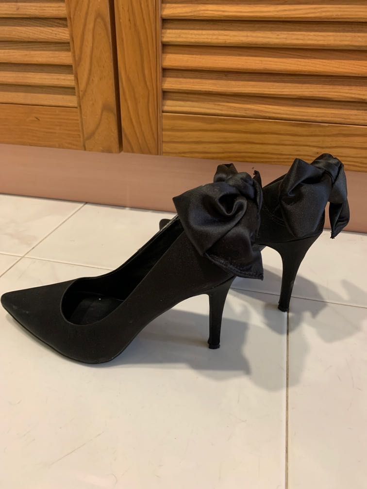 black high heels with bow